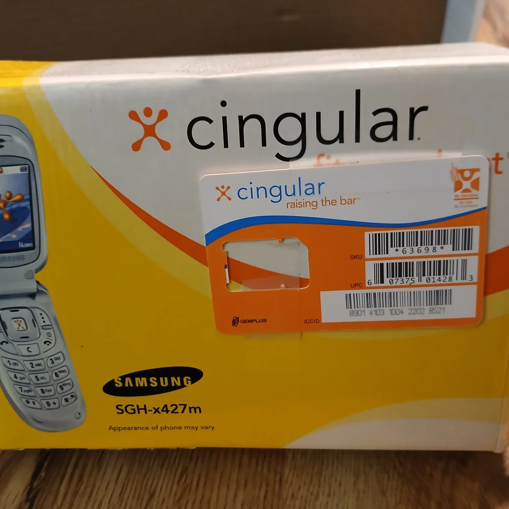 Samsung Silver Flip Phone with Accessories